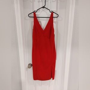 Lulus cocktail dress size medium. Front slit. New with tags